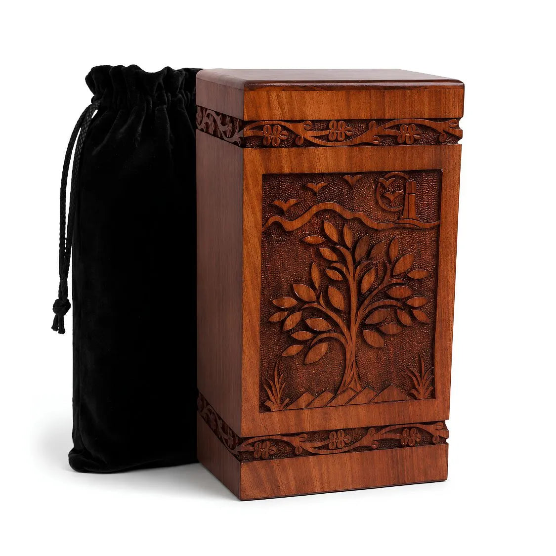 Carved Tree of Life Wooden Urn Box with tree design and black drawstring bag on a white background