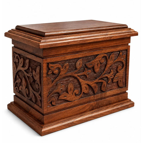 engraved wooden urn with intricate carvings on a white background