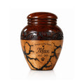 personalized wood pet urn with name with engraved text on a white background
