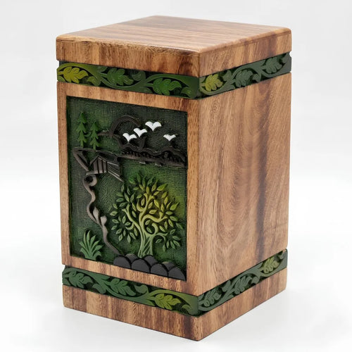 hand carved wood urn box with nature-themed carvings on a white background