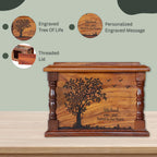 Wooden urn with engraved tree design and personalized message on a light green background