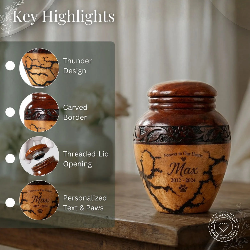 Wooden urn with engraved design and personalized text on a wooden surface.