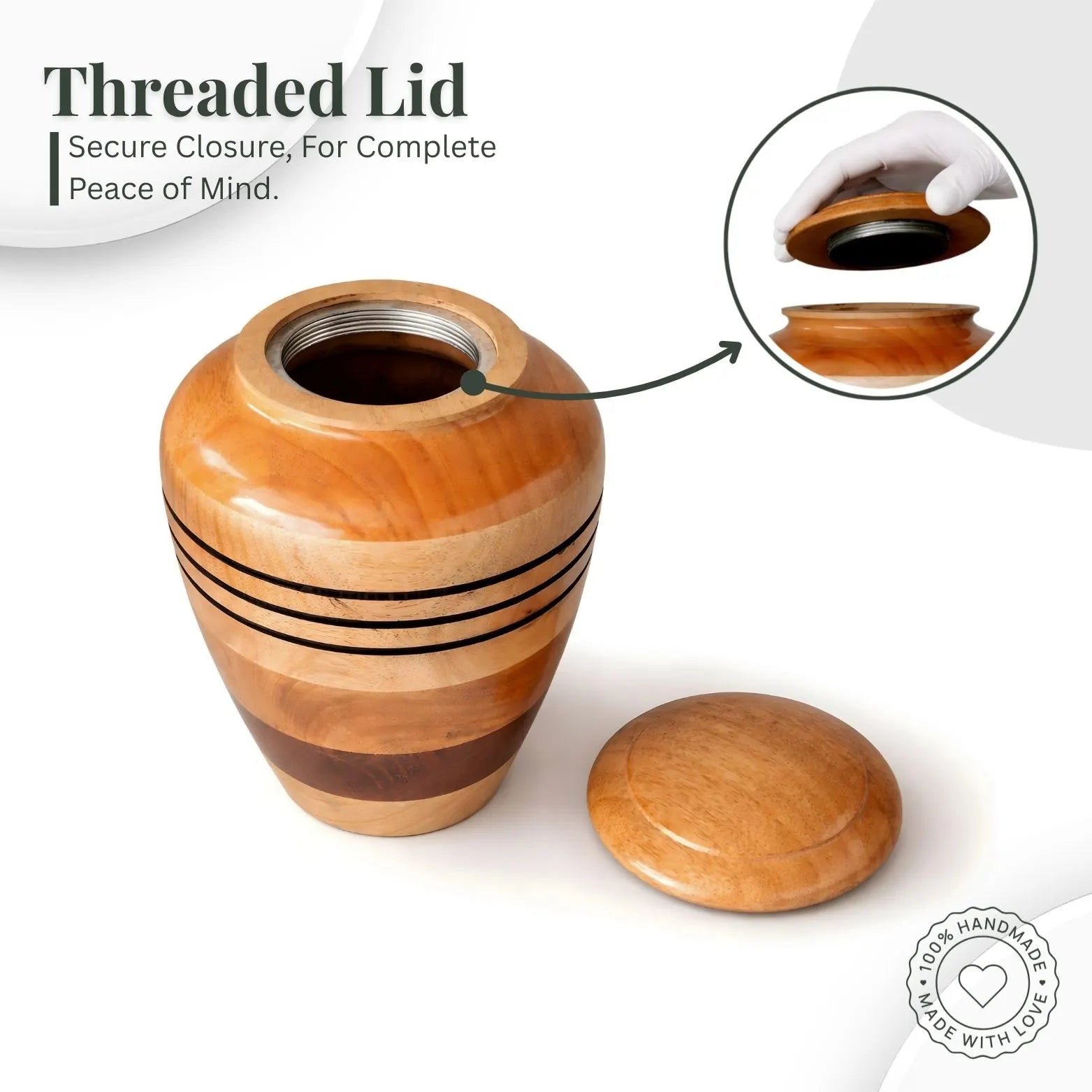 Wooden urn with threaded lid on a white background