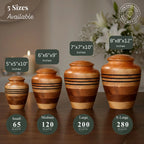 Set of wooden urns with dimensions and capacities displayed on a wooden surface.